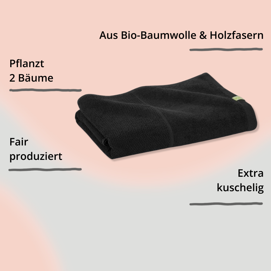 Graues Saunatuch gefaltet mit Impact