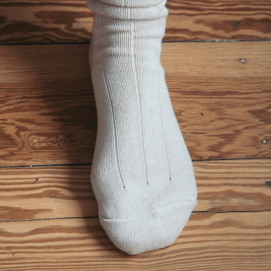 Stricksocken von Salzwasser – Sand am Fuß