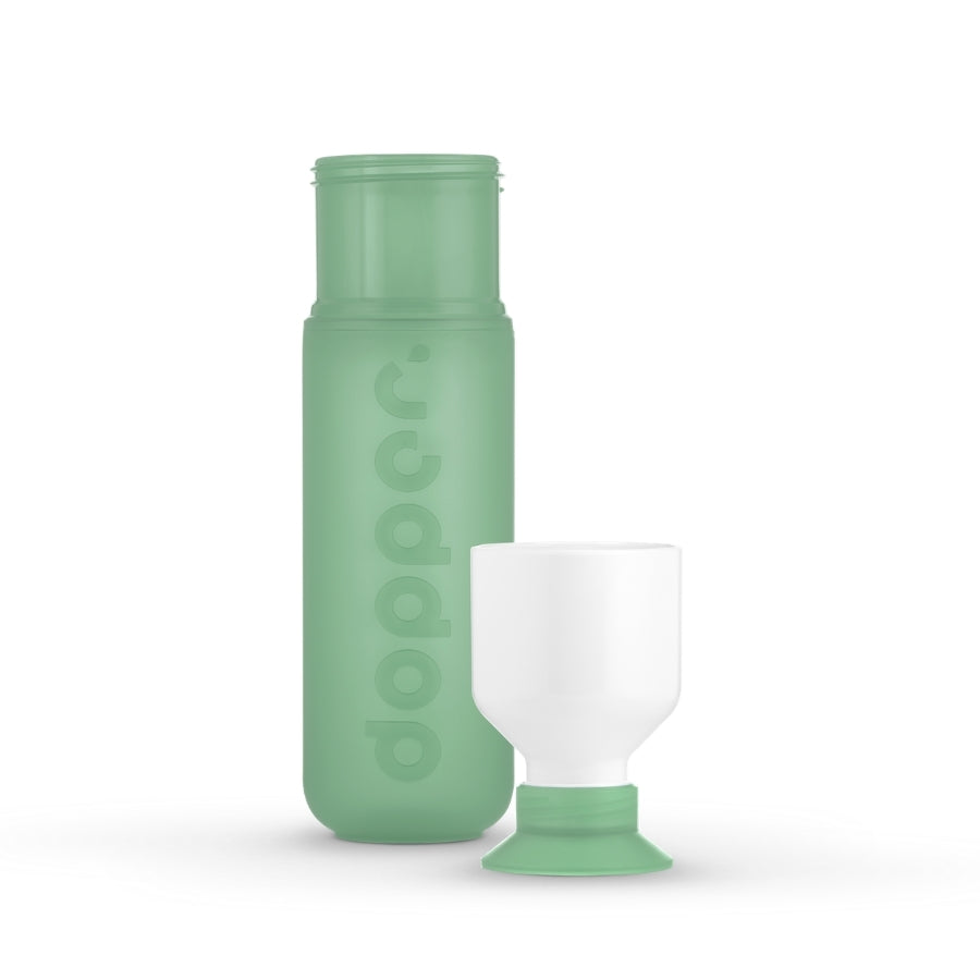 Dopper Flasche Grün Decke abgeschraubt