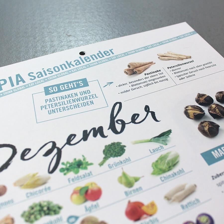 Utopia Wandkalender aufgeklappt, Monat Dezember Nahaufnahme