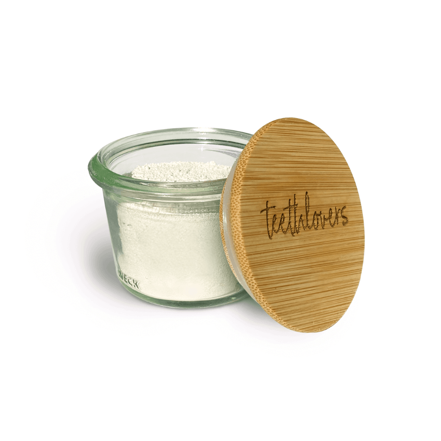 teethlovers Zahnpulver Pfefferminze & Zitrone im geöffneten Glas