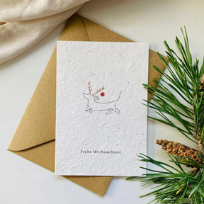 Einpflanzbare Postkarte – Weihnachten  von BlühWerk Papeterie – Dackel