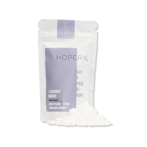 Milchbad – Lavender Orange von Hopery, Verpackung mit Häufchen