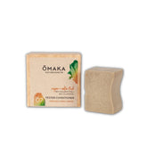 Fester Conditioner von Omaka – Verpackung und Seife vor weißem Hintergrund