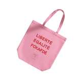 Tote Bag – LIBERTÉ ÉGALITÉ FUCK AFD von arrel. Pink mit roter Schrift vor weißem Hintergrund
