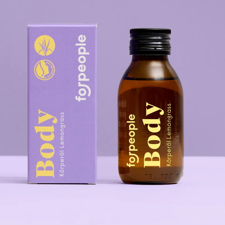Körperöl Body Oil von vorne mit Verpackung vor lila Hintergrund