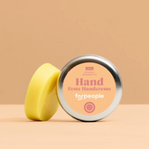 Feste Handcreme – Bergamotte (vegan) von forpeople mit Dose vor orangen Hintergrund