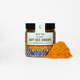 Duft des Orients in Glasverpackung mit Gewürzhäufchen von vorne 